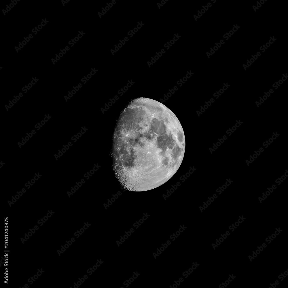 Fototapeta premium Beautiful half moon on the black sky background