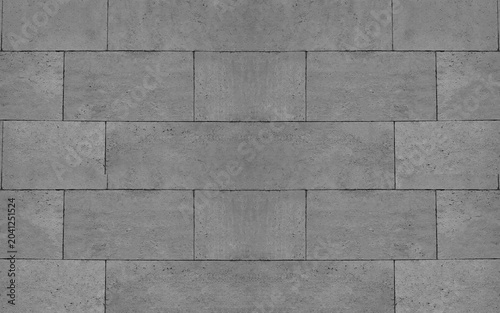 Front view of a wall made of gray slabs. background of a new and modern wall or building exterior grey slabs Marble brick pattern floor abstract natural marble black gray wall Top view and front view