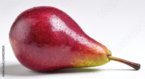 A single ripe red pear with a green stem on a white background.