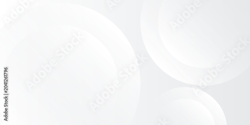 Abstract grey background with dynamic circular shapes and modern minimalist design.
