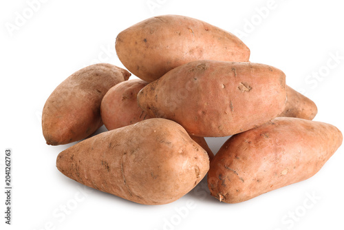 Fresh sweet potatoes on whi...