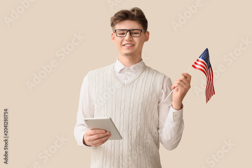 Male teacher with USA flag ...