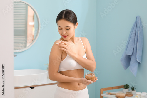 Beautiful Asian woman apply...