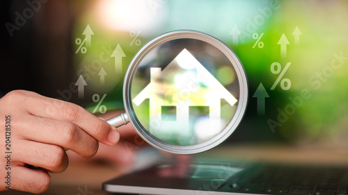 Принти на полотні Real estate investor analyzing property investment growth and mortgage trends through housing market data to improve financial returns, asset value, rental income, and wealth stability