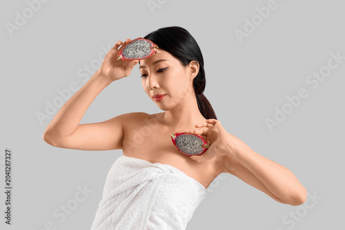 Pretty young Asian woman wi...