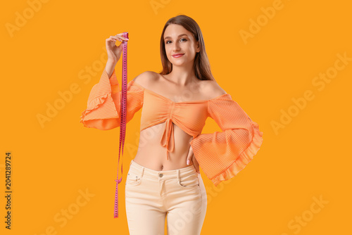Beautiful young woman with ...