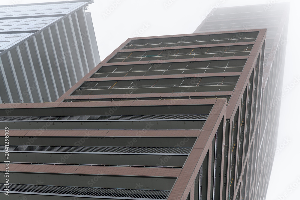 Naklejka premium oblique skyward view of No. 31 Condos (by Lanterra), designed by Arquitectonica and Arcadis/IBI Group, located at 31 Parliament St, Toronto
