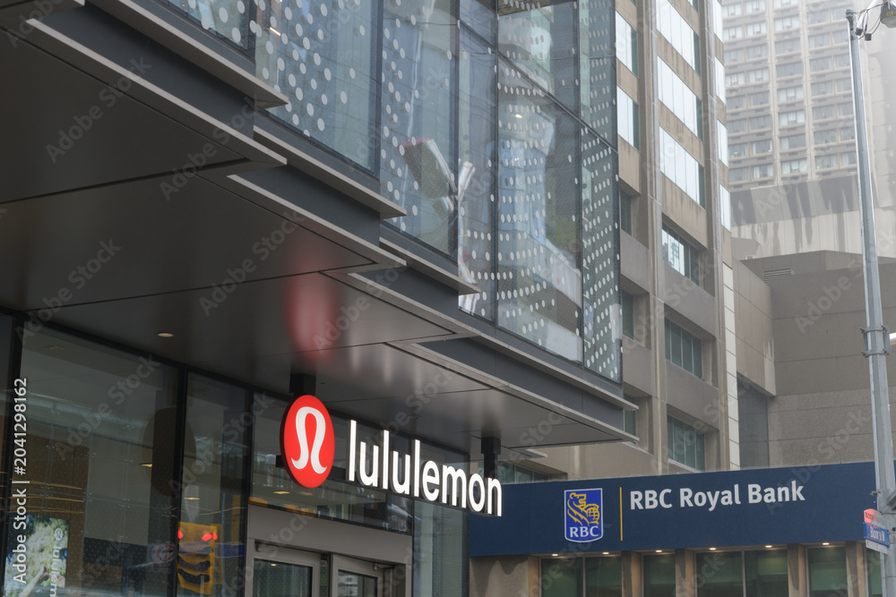 Naklejka premium exterior building and sign of lululemon, a sportswear store, located at 2 Bloor St W and RBC, Royal Bank located at 2 Bloor St E, Toronto