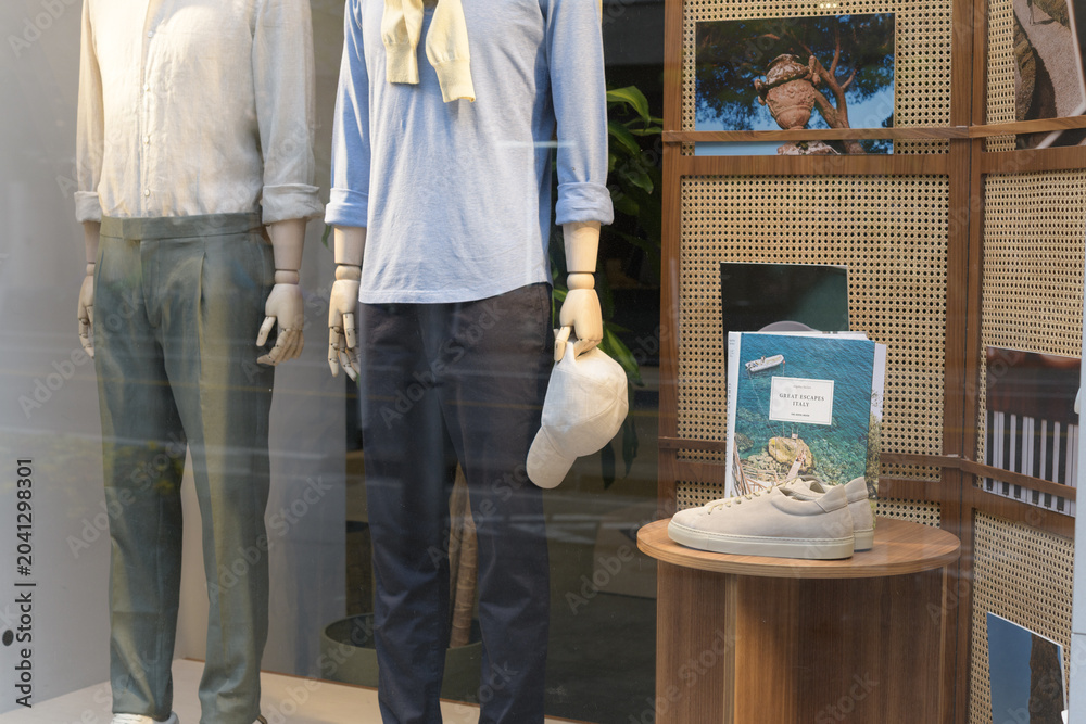 Naklejka premium display window with mannequins latest fashion designs at Luca Faloni, a men's clothing store, located at 130 Bloor St W, Toronto