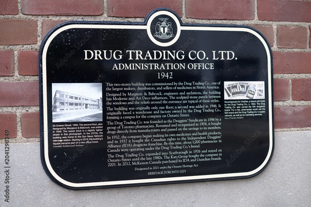 Naklejka premium wall-mounted Heritage Toronto 2025 plaque with inscription for Drug Trading Co Ltd, 25 Ontario St
