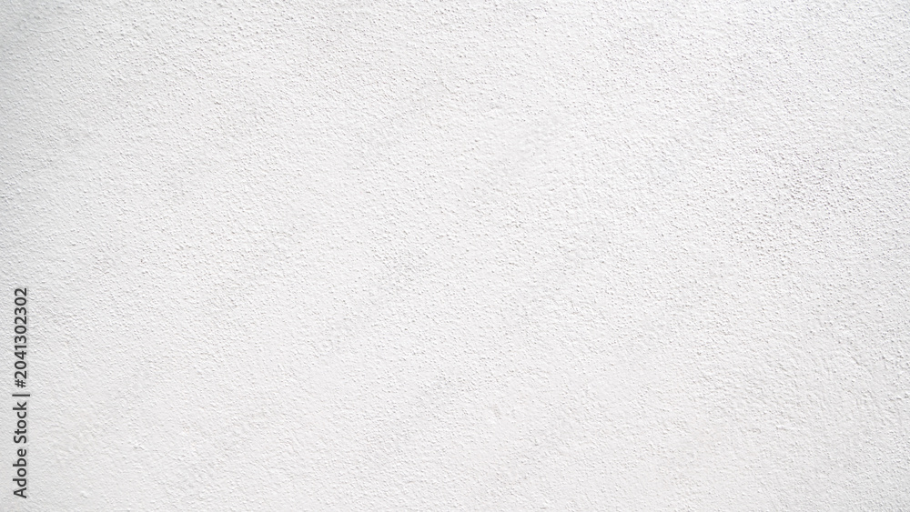 Obraz premium Abstract beige stucco wall texture background with a subtle rough finish and copy space.