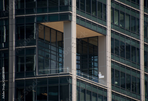 Glass High-Rise Facade with Open Balcony in Seattle