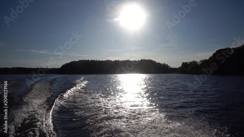 Stockholm, Sweden A view of the water of Lake Malaren from a moving motorboat on a sunny summer day. 