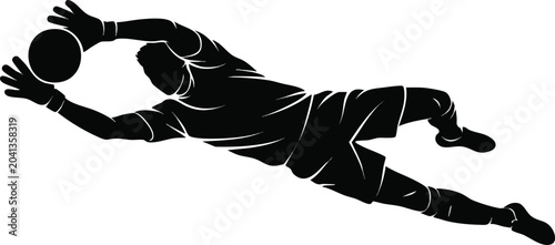 Silhouette of a soccer goalkeeper diving to save a goal