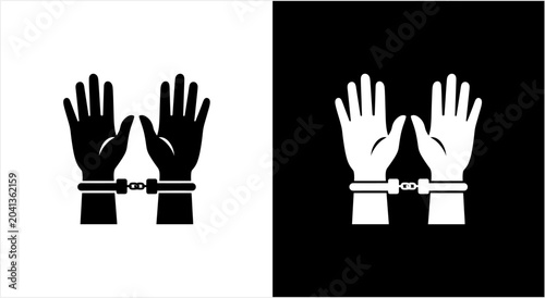 Foto Iconic Representation of Handcuffed Hands in Black and White.