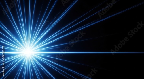 Bright blue starburst lens flare with sharp light rays on black background