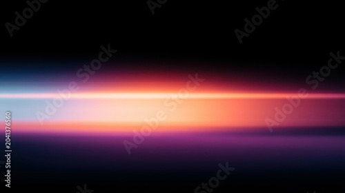 An abstract gradient of vibrant colors against a dark background.