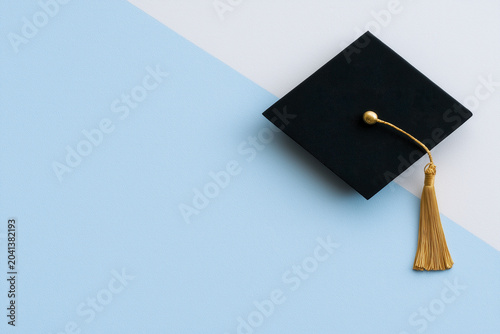 Minimal Graduation Cap Background with Elegant Copy Space
