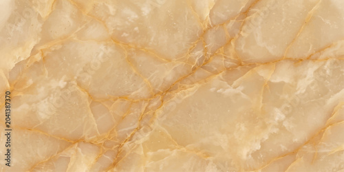 фотографія A translucent onyx slab with intricate golden veining, showcasing the natural beauty and rich texture of the polished stone