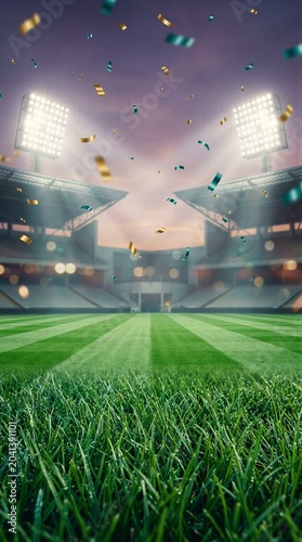 Empty football stadium pitch with confetti at twilight