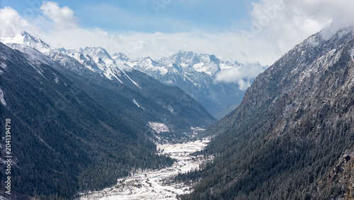 Cuadro en lienzo Aerial panoramic winter scenery of snow mountain valley in Bailang Valley, Nying