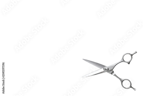 фотографія Open professional hairdressing scissors angled on lower right