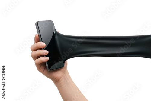 Tableau sur toile Hand holding smartphone with screen stretching like black slime