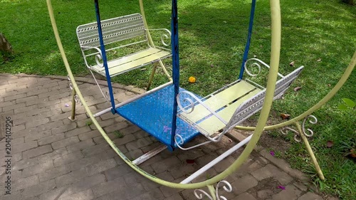 Empty Swing Ride in Calm Recreational Park