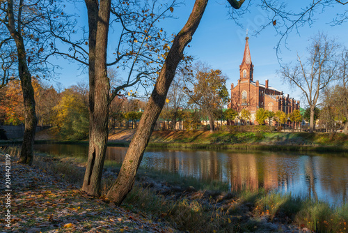 Lutheran Church of the Resurrection of Christ in Tsarskoye Selo on the bank of the 4th Lower Pond on a sunny autumn day, Pushkin, St. Petersburg, Russia