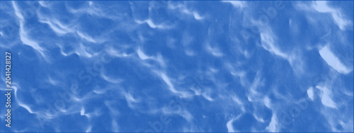 Crumpled cellophane or paper texture. A sense of space, blue sky, and clouds. Abstract background with wrinkled waves, wrapped with organic wavy patterns and a retro dithered effect. Vector.