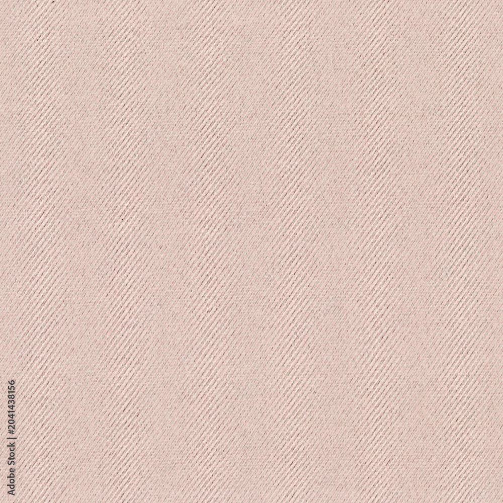 Fototapeta premium Soft pink fabric texture background with a subtle woven pattern
