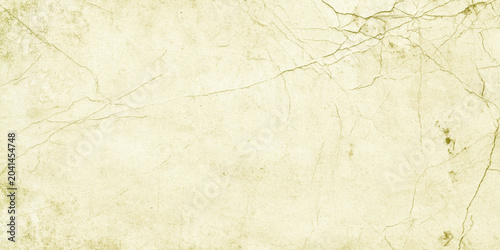 Photos Vintage beige cracked paper texture background with green undertones for design