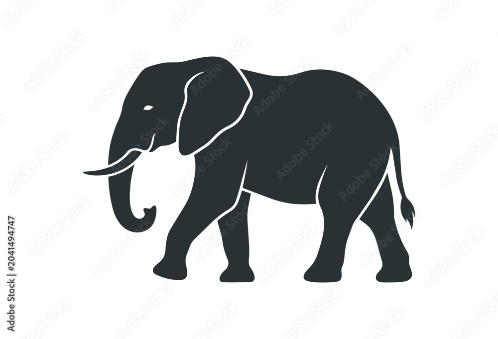 Fototapeta premium Silhouette of an African Elephant walking gracefully.