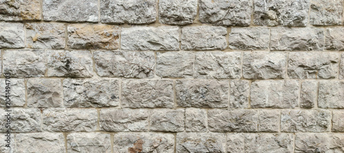 Slika na platnu Ancient stone wall texture background with grey stones for medieval architectura