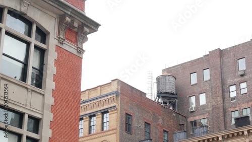 Schilderij op canvas New York City urban red brick building architecture, Lower Manhattan rooftop, United States of America