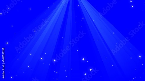 Shining blue light rays with falling stars and sparkles on a vibrant blue background