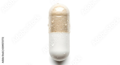 Generic medicine capsule with water droplets on white background