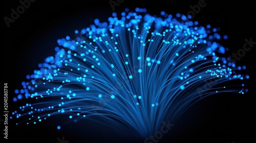 Brilliant blue illuminated strands radiate outwards against a dark background