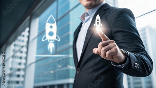 Businessman in suit interacting with a virtual rocket icon, symbolizing innovation, startup growth, and technology advancement in a modern office environment.