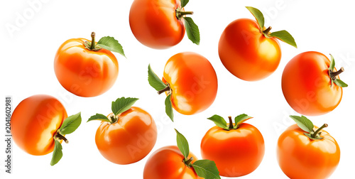 Multiple ripe orange persimmons with green leaves isolated on white background, concept of organic healthy food