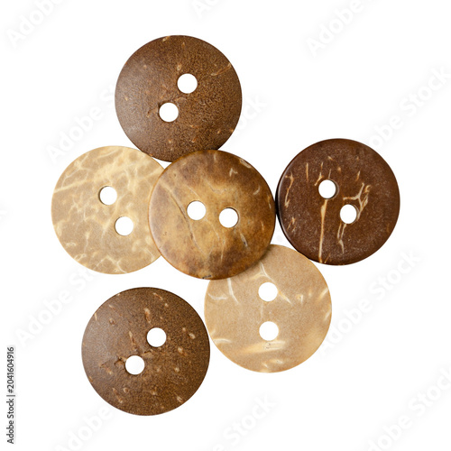 Coconut shell buttons isolated on white background. Round natural eco friendly clothing buttons for sewing, handicraft, fashion design,  material for catalog, packaging, scene creator.
