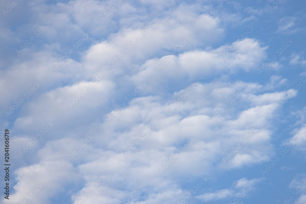 Fototapeta premium Natural background of blue sky and white clouds