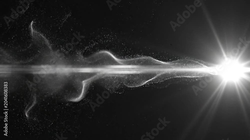 A bright light shines with white smoke on a black background.