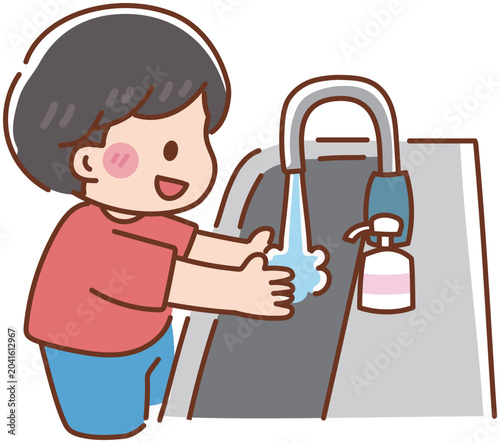 Foto 水道で手を洗う男の子