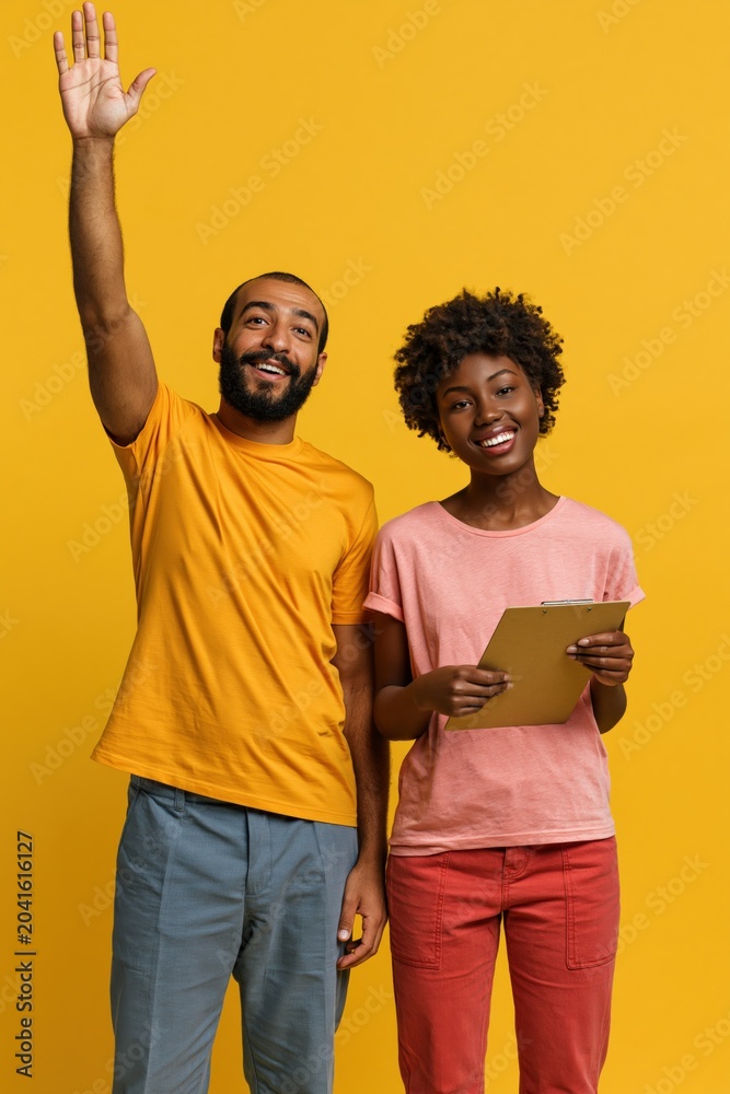 Obraz premium Smiling diverse couple with clipboard and raised hand for survey signup or customer feedback campaign poster and marketing banner