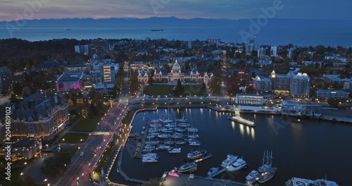 Aerial view of BC Legislative Parliament Building near harbor at night in Victoria, British Columbia, Canada	
