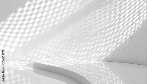 A modern white room with sunlight shining through a window and casting a pattern on the wall