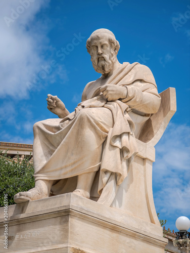 Seated Plato statue in Athens beneath an open sky, capturing the timeless spirit of Greek philosophy, learning, and neoclassical elegance.