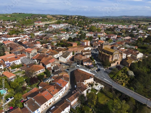 Aerial view of a town with narrow streets between densely built-up blocks of flats, Venerque, Haute-Garonne, Occitania, France