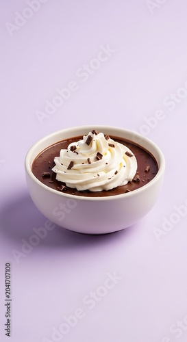 Creamy Chocolate Pudding Topped with Whipped Cream in White Bowl on Pastel Purple Background